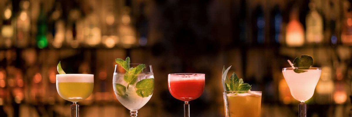 close-up-of-cocktails-of-different-colors-in-diffe-2026-01-06-08-56-03-utc.jpg